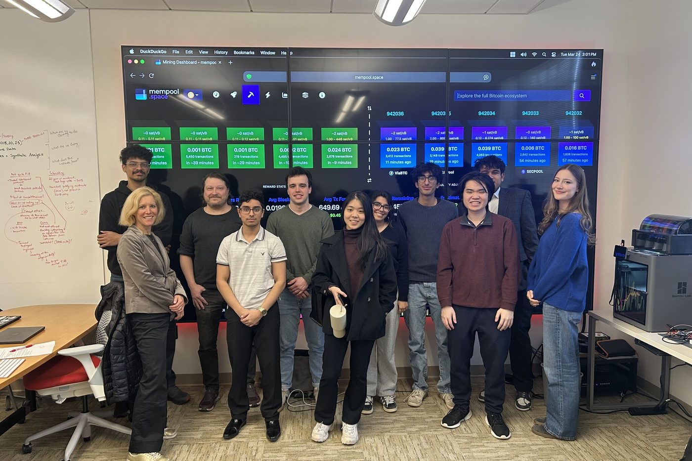 The research team explores the world of Bitcoin.