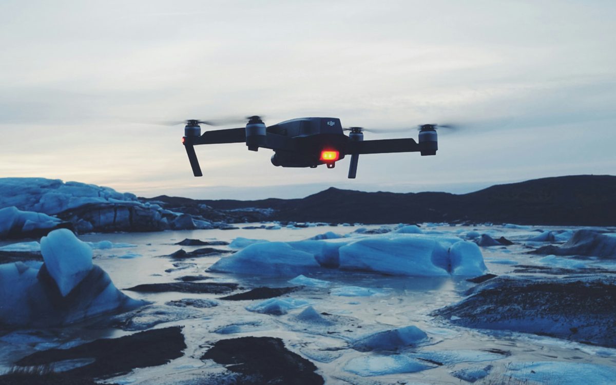 A drone flying over an Icelandic glacial lagoon