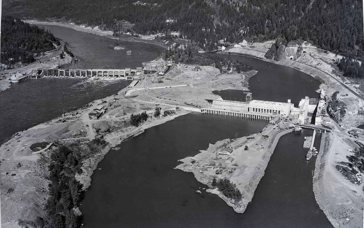 Aerial view of a hydroelectric dam and lock under construction on a river