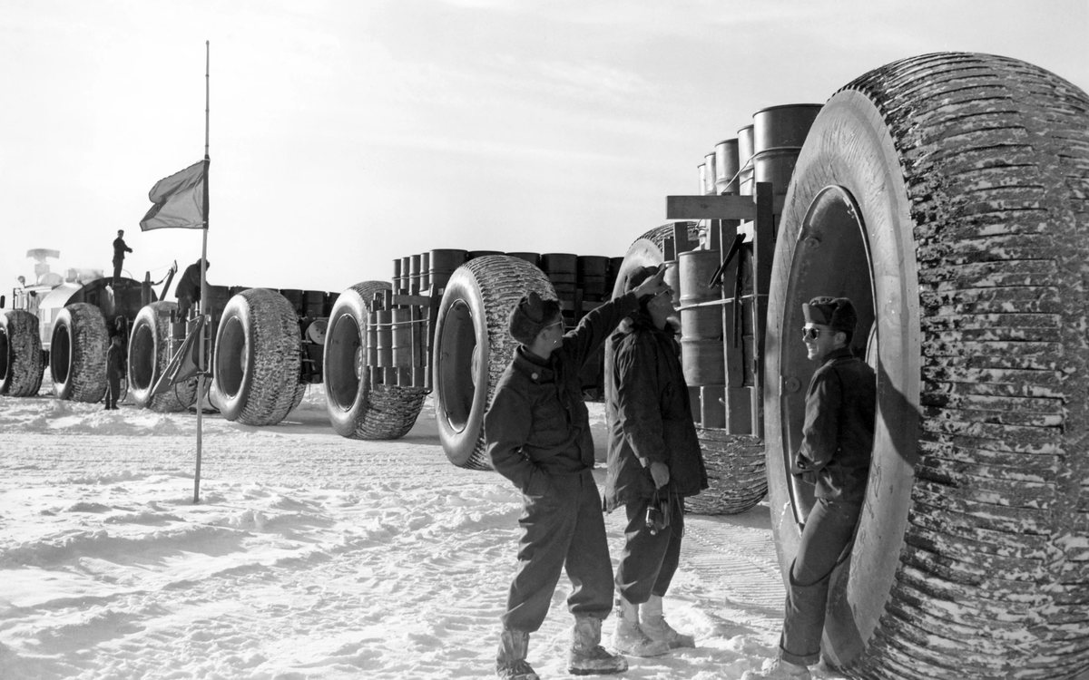 A polar convoy of oversized vehicles on the ice